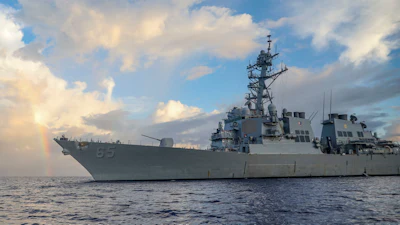 In this photo provided by U.S. Navy, Arleigh Burke-class guided-missile destroyer USS Benfold (DDG 65) conducts routine underway operations in the Philippines Sea on June 24, 2022.