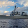In this photo provided by U.S. Navy, Arleigh Burke-class guided-missile destroyer USS Benfold (DDG 65) conducts routine underway operations in the Philippines Sea on June 24, 2022.