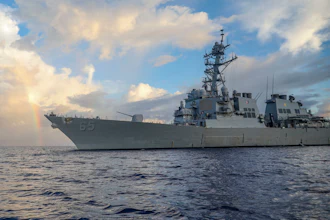 In this photo provided by U.S. Navy, Arleigh Burke-class guided-missile destroyer USS Benfold (DDG 65) conducts routine underway operations in the Philippines Sea on June 24, 2022.