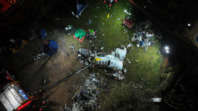 A view of the debris of a Voepass airplane that crashed the previous day, in Vinhedo, Sao Paulo state, Brazil, Aug. 10, 2024.