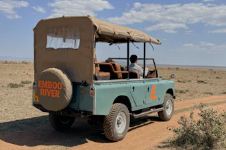 In this photo taken with a smartphone, an electric safari van operated by Emboo Camp drives through the Maasai Mara, Kenya, Saturday, Aug. 29, 2026.