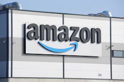 An Amazon company logo marks the facade of a building, March 18, 2022, in Schoenefeld near Berlin.