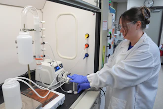 Stephanie Stoll starts a pump as part of an experiment studying the removal of PFAS from water samples at a U.S. Environmental Protection Agency lab in Cincinnati, April 10, 2024.
