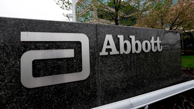 A sign at an Abbott Laboratories campus facility is displayed, April 28, 2016, in Lake Forest, Ill.