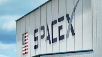 The SpaceX logo is displayed on a building, May 26, 2020, at the Kennedy Space Center in Cape Canaveral, Fla.