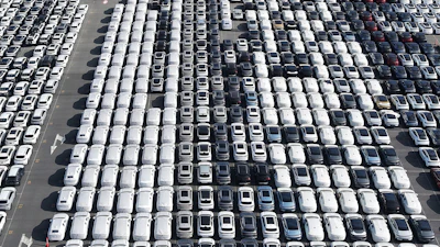 Aerial view of new cars waiting for shipment at a port in Shanghai, China, on Jan. 14, 2026.