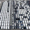Aerial view of new cars waiting for shipment at a port in Shanghai, China, on Jan. 14, 2026.