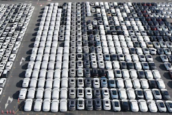 Aerial view of new cars waiting for shipment at a port in Shanghai, China, on Jan. 14, 2026.