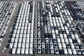 Aerial view of new cars waiting for shipment at a port in Shanghai, China, on Jan. 14, 2026.