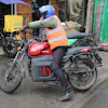 A rider sits on an electric Spiro motorcycle in Nairobi, Kenya, on Feb. 24, 2026.