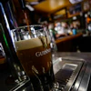 A pint of Guinness beer is poured on St. Patrick's Day on March 17, 2023, in Bellows Falls, Vt.
