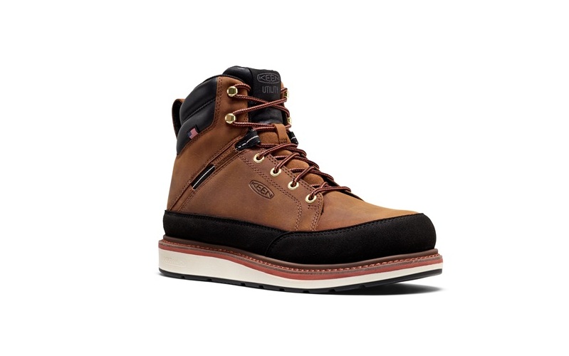 Brown leather hiking boot with black accents and cream-colored sole