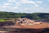 Mesabi Metallics conducts the first production blast at its iron ore mine in Minnesota.