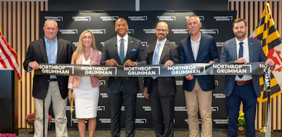 Maryland Gov. Wes Moore, Jenna Paukstis, vice president and general manager, weapon systems, Gordon LoPresti, senior director, propulsion solutions and controls, and Whiting-Turner Construction executives cut the ribbon at Northrop Grumman’s new Propulsion Innovation Center in Elkton, Maryland.