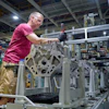 A worker at GM’s Flint Engine Operations, where the all-new Gen-6 5.7L and 6.6L V8s are assembled.