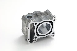Aluminum engine cylinder head with circular bore opening and mounting bolt holes