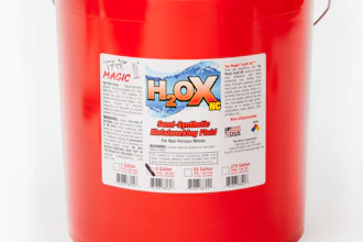 Red H.O.X semi-synthetic metalworking fluid bucket with white label and metal handle