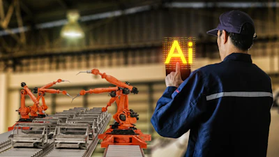 Industrial worker in blue uniform monitoring orange robotic arms on factory assembly line with AI symbol glowing in background