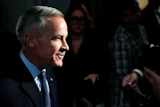 Prime Minister Mark Carney takes questions from journalists as he arrives for a meeting of the federal cabinet on Parliament Hill in Ottawa, Oct. 20, 2026.