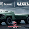GM Defense UGV unmanned ground vehicle concept in sage green with autonomous capabilities on stormy landscape