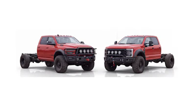 Two red lifted pickup trucks with custom front bumpers and roof lights displayed side by side