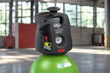 ACE VarioVPR Protect laser level mounted on green pressurized cylinder in industrial workshop