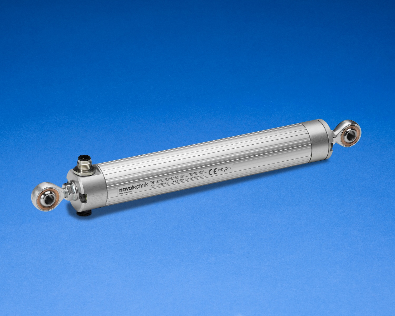 Silver linear position transducer sensor with ball joint mounts on blue background