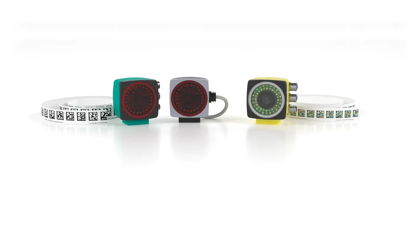 Three colorful retro-style measuring tapes in teal, gray, and yellow-green with white measurement scales displayed against a white background