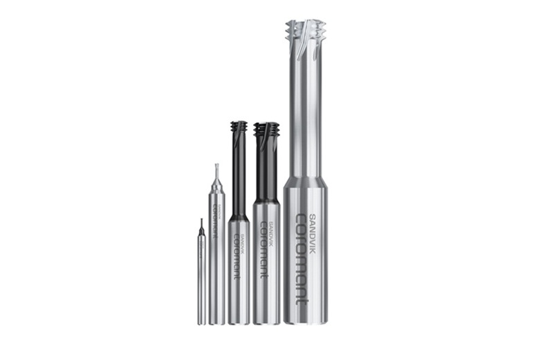 Sandvik precision cutting tools and end mills arranged in ascending size order