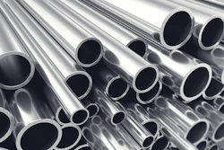 Stacked polished metal tubes and pipes arranged diagonally showing circular openings and reflective surfaces